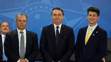 O ministro Paulo Guedes, Jair Bolsonaro e Gustavo Montezano, em evento no Planalto. Foto: Joedson Alves/EFE 