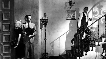 Cena de 'Pacto de Sangue',com Fred MacMurray e Barbara Stanwyck. Foto: Paramount