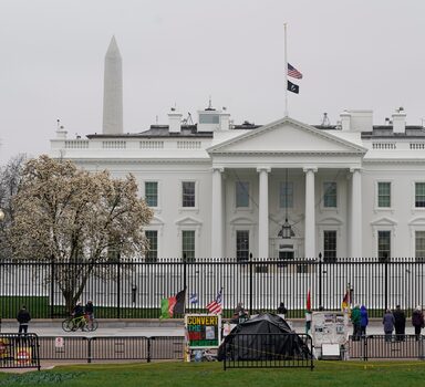 An American flag flies at half-staff in remembrance of former Secretary of State Madeleine Albright above the White House in Washington, Thursday, March 24, 2022. Albright, a child refugee from Nazi- and then Soviet-dominated Eastern Europe who rose to become the first female secretary of state, died at age 84 on Wednesday. (AP Photo/Patrick Semansky)