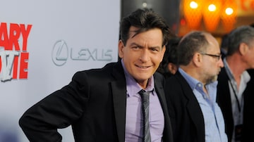 FILE - Charlie Sheen, a cast member in "Scary Movie V," poses at the premiere of the film on April 11, 2013, in Los Angeles. Sheen’s neighbor was arrested after being accused of assaulting the actor in a Malibu home this week, authorities said. Electra Schrock was arrested for assault with a deadly weapon, the Los Angeles Sheriff’s Department said in a statement Friday, Sec. 22, 2023. (Photo by Chris Pizzello/Invision/AP, File)