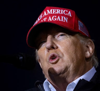 FILE PHOTO: Former U.S. President Donald Trump speaks during a rally to boost Pennsylvania Republican U.S. Senate candidate Dr. Mehmet Oz, ahead of the May 17 primary election at the Westmoreland Fairgrounds in Greensburg, Pennsylvania, U.S. May 6, 2022. REUTERS/Hannah Beier/ REUTERS File Photo