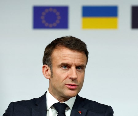 TOPSHOT - French President Emmanuel Macron speaks during a press conference at the end of the international conference aimed at strengthening Western support for Ukraine, at the Elysee presidential palace in Paris, on February 26, 2024. The meeting at the Elysee Palace will be a chance for participants to "reaffirm their unity as well as their determination to defeat the war of aggression waged by Russia in Ukraine", the French presidency said. (Photo by GONZALO FUENTES / POOL / AFP)