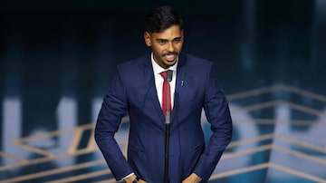 Botafogo midfielder Guilherme Madruga speaks on stage after receiving The FIFA Puskás Award during the Best FIFA Football Awards 2023 ceremony in London on January 15, 2024. (Photo by Adrian DENNIS / AFP)