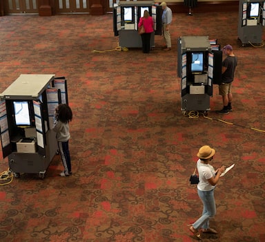 Voters cast their ballots at Peachtree Road United Methodist Church during the Georgia Primary Election Day in Atlanta, Georgia, U.S. May 24, 2022.