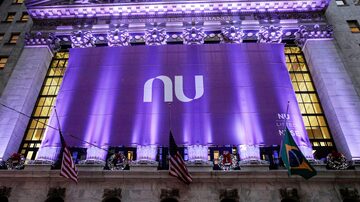 A banner for Nubank, the Brazilian FinTech startup, hangs on the facade at the New York Stock Exchange (NYSE) to celebrate the company's IPO in New York, U.S., December 9, 2021. REUTERS/Brendan McDermid