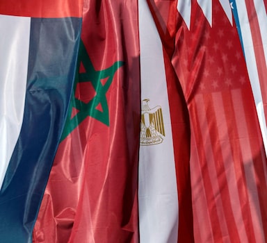 Flags are seen ahead of "The Negev Summit", hosted by Israel's Foreign Minister Yair Lapid and attended by U.S. Secretary of State Antony Blinken, and the foreign ministers of the UAE, Bahrain, Morocco and Egypt, in Sde Boker, Israel, March 27, 2022. REUTERS/Amir Cohen