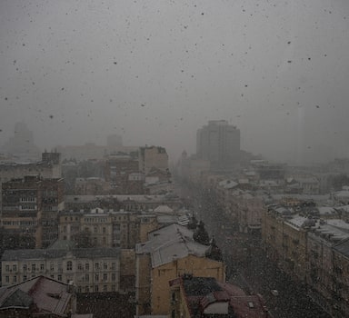 Snow blankets Kyiv on Orthodox Palm Sunday in Ukraine, on April 17, 2022. Many elderly Ukrainians with dementia have woken up to a new war, day after day. (Lynsey Addario/The New York Times) — NO SALES