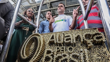 Cápsulas de bala formam a logotipo do novo partido Aliança pelo Brasil, de Jair Bolsonaro, em seu evento de lançamento. Foto: Gabriela Biló/Estadão