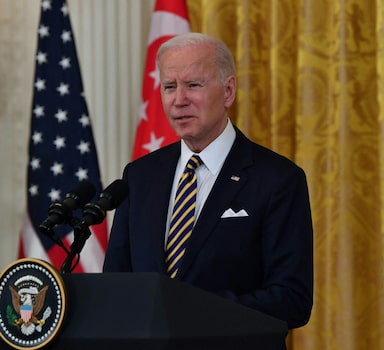 US President Joe Biden speaks during a joint news conference with Prime Minister Lee Hsien Loong of Singapore in the East Room of the White House on March 29, 2022 in Washington, DC. (Photo by Nicholas Kamm / AFP)