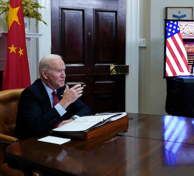 FILE - President Joe Biden meets virtually with Chinese President Xi Jinping from the Roosevelt Room of the White House in Washington, on Nov. 15, 2021.  (AP Photo/Susan Walsh, File)