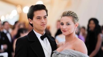 Lili Reinhart and Cole Sprouse arrive at the Metropolitan Museum of Art Costume Institute Gala (Met Gala) to celebrate the opening of “Heavenly Bodies: Fashion and the Catholic Imagination” in the Manhattan borough of New York, U.S., May 7, 2018. REUTERS/Carlo Allegri