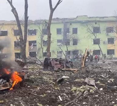A view shows cars and a building of a hospital destroyed by an aviation strike amid Russia's invasion of Ukraine, in Mariupol, Ukraine, in this handout picture released March 9, 2022.  Press service of the National Police of Ukraine/Handout via REUTERS ATTENTION EDITORS - THIS IMAGE HAS BEEN SUPPLIED BY A THIRD PARTY.     TPX IMAGES OF THE DAY