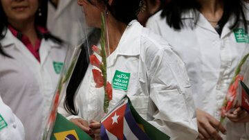 Médicos cubanos que vieram trabalhar no Brasil na primeira versão do Mais Médicos, lançado em 2013. Foto: Fernando Medina/REUTERS