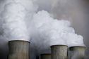 FILE PHOTO: Steam rises from the cooling towers of the coal power plant of RWE, one of Europe's biggest electricity and gas companies in Niederaussem, Germany,  March 3, 2016.    REUTERS/Wolfgang Rattay//File Photo