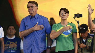 BrazilIan president Jair Bolsonaro and First Lady Michelle Bolsonaro attend the March for Jesus Christ event in Rio de Janeiro, Brazil, on August 13, 2022. (Photo by MAURO PIMENTEL / AFP)